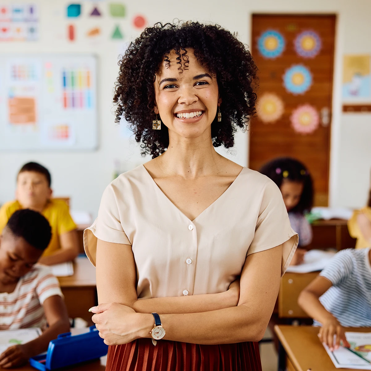 Teacher in classroom with kids